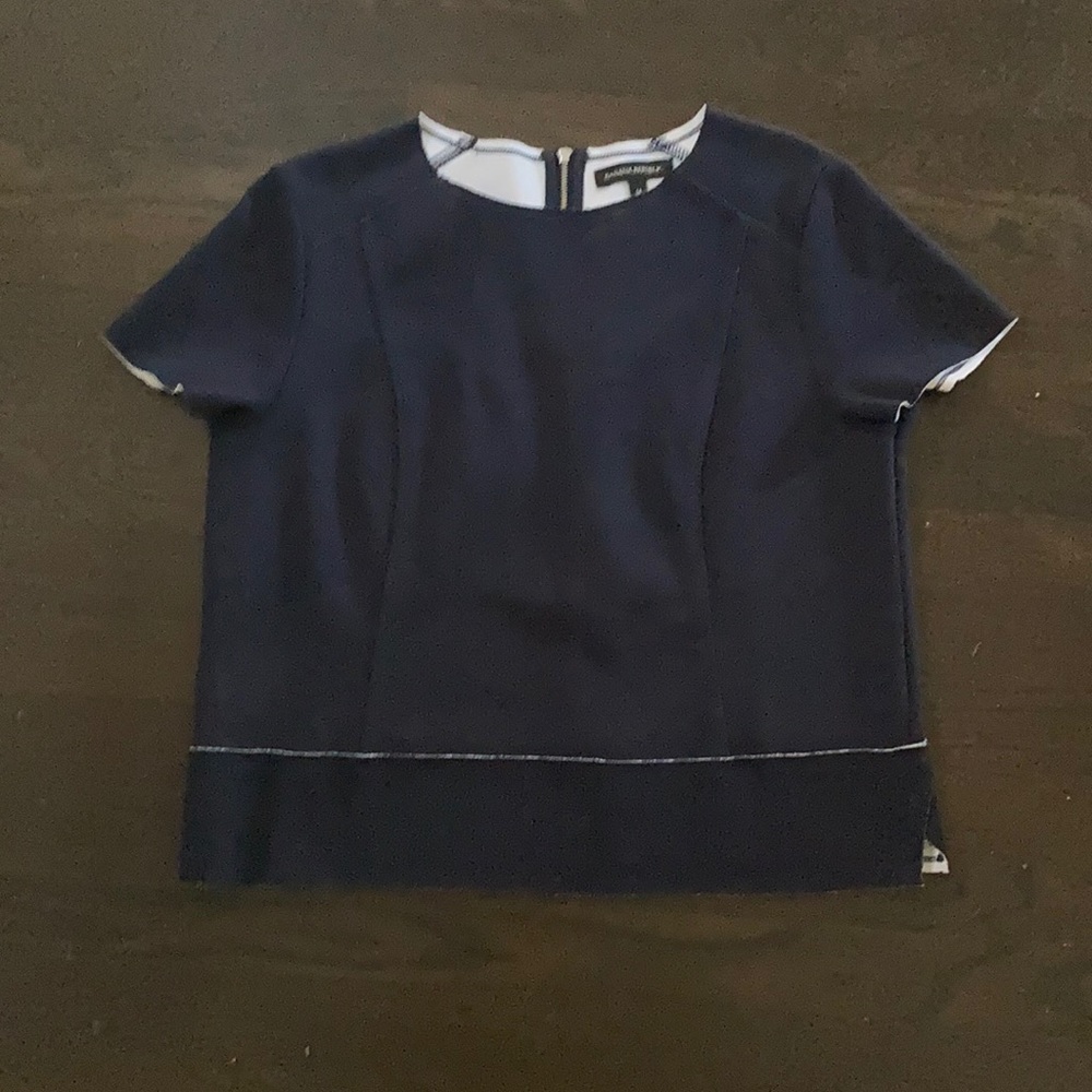 Navy blue flecked in white top